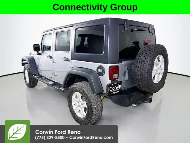 Used 2014 Billet Clearcoat Metallic Jeep Unlimited Sport image 5