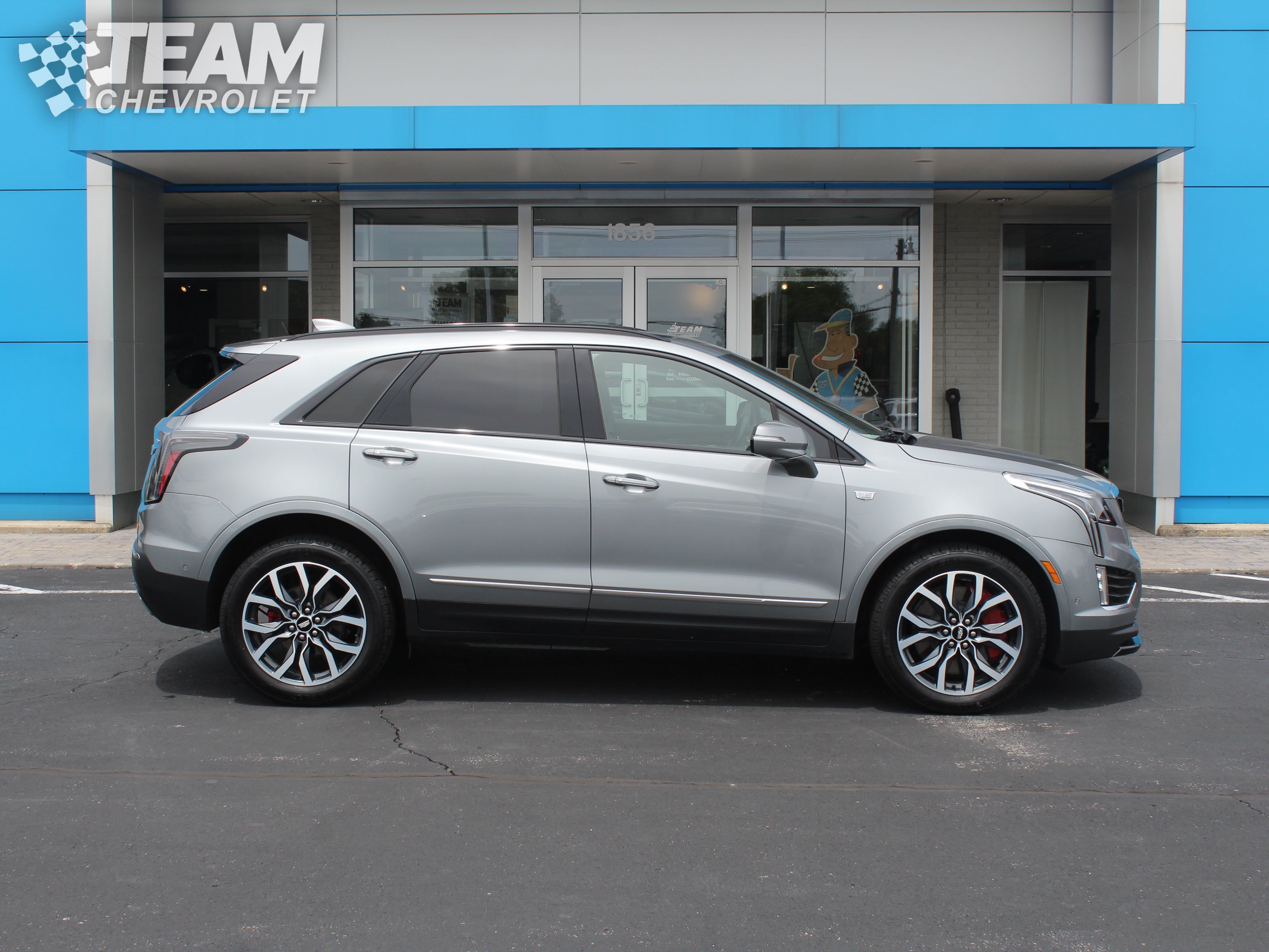 Used 2024 Argent Silver Metallic Cadillac Sport image 3