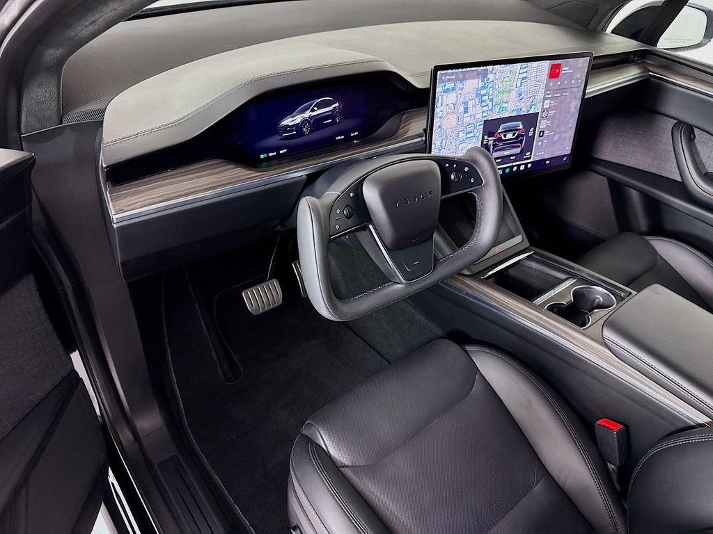 Used 2023 Solid Black Tesla  image 9