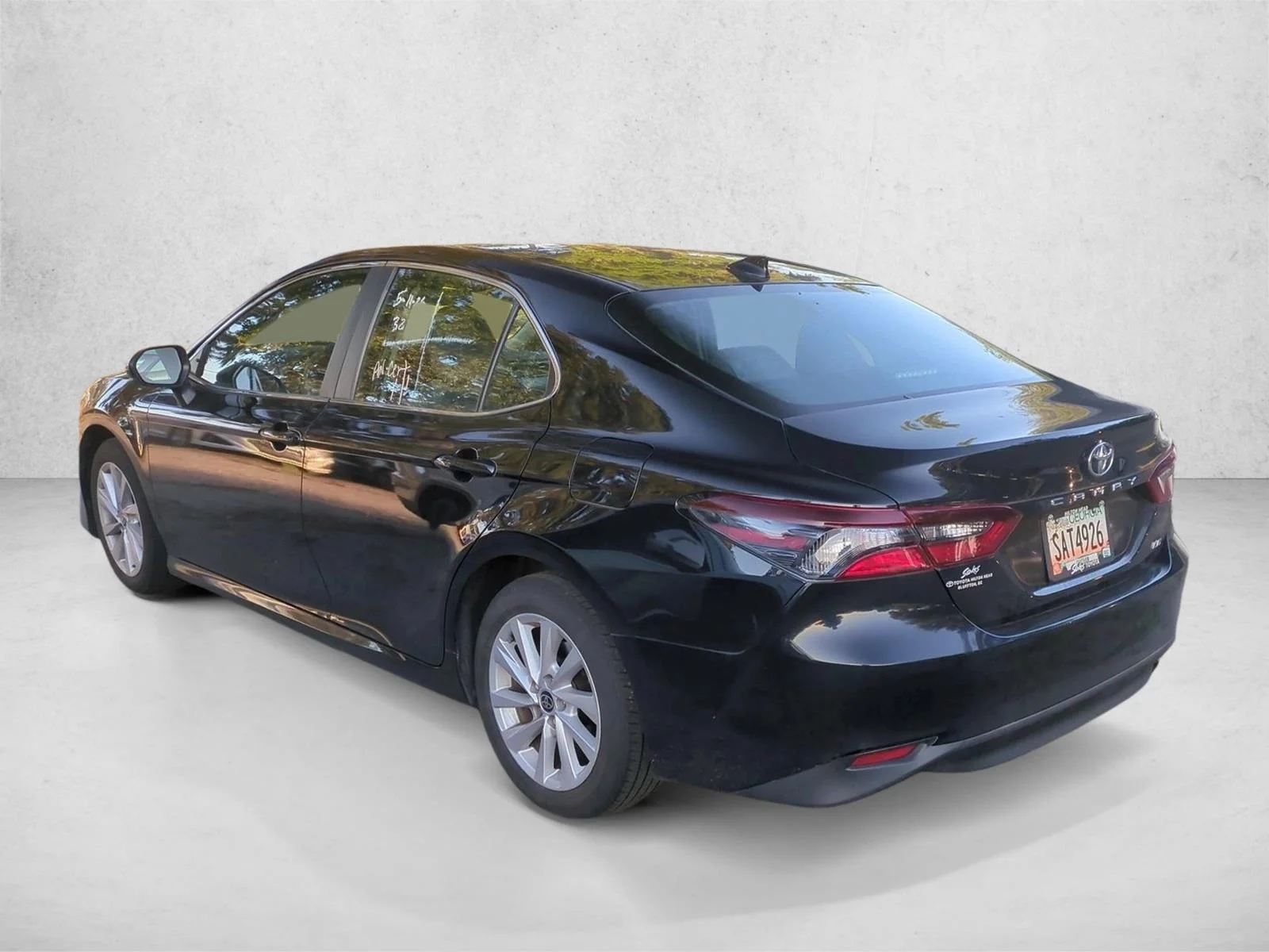 Used 2024 Midnight Black Metallic Toyota LE image 8