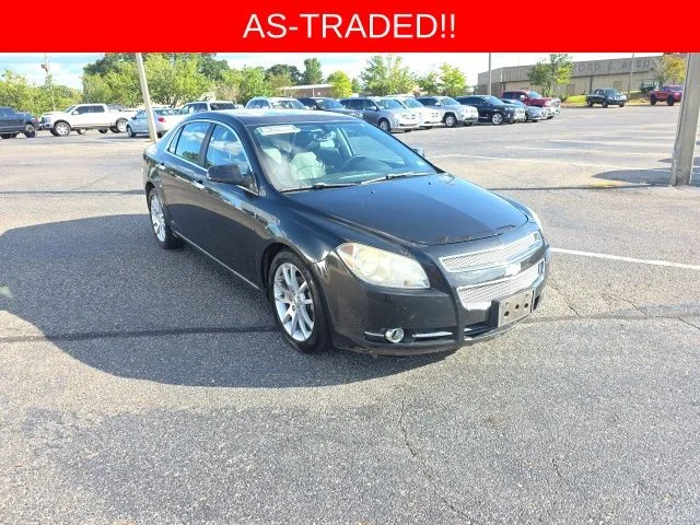 Used 2010 Black Chevrolet LTZ image 1