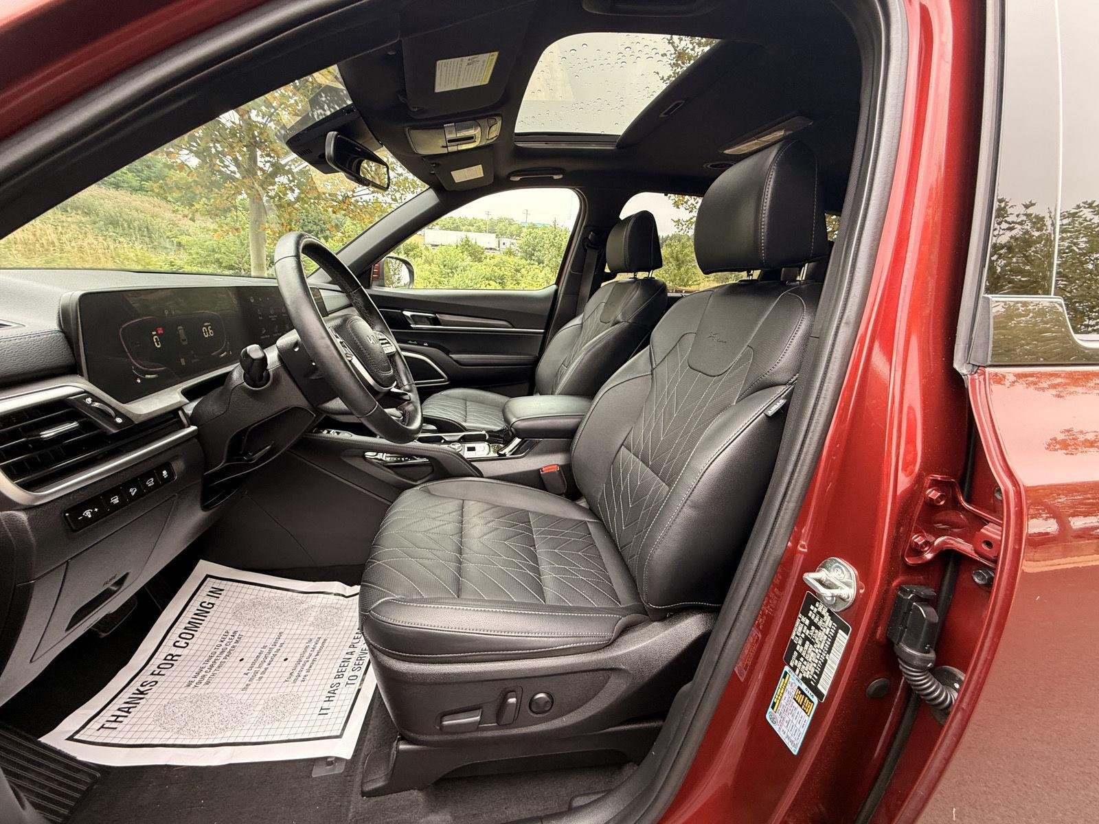 Used 2024 Dawning Red Kia EX X-Line image 14