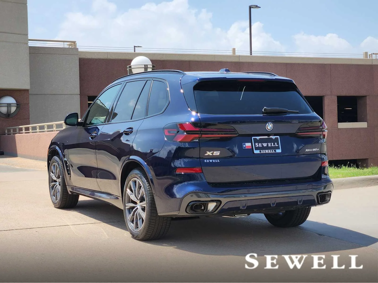 New 2026 Tanzanite Blue II Metallic BMW xDrive50e image 3