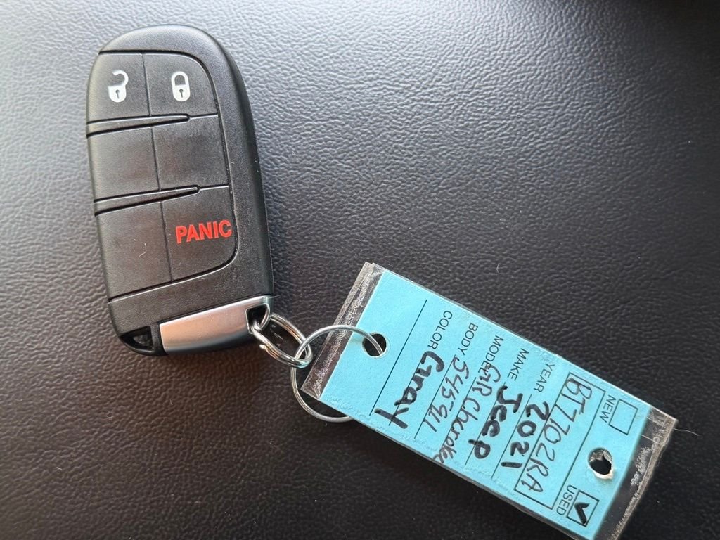 Used 2021 Billet Silver Metallic Jeep Laredo E image 36