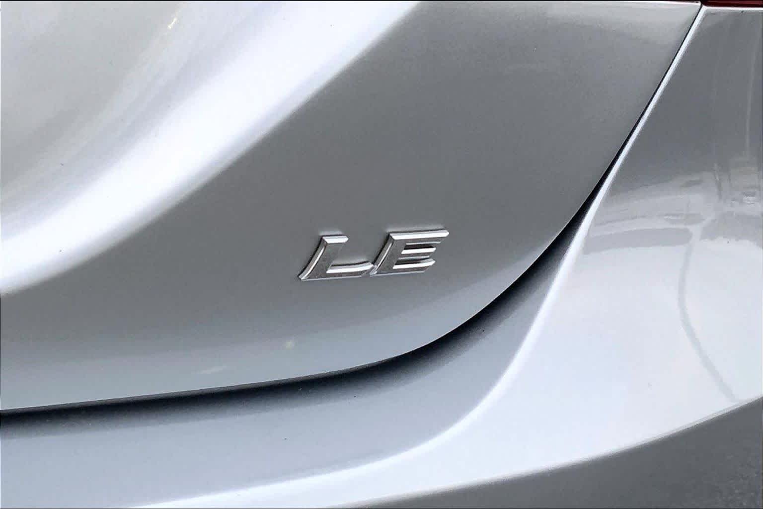 Used 2024 Celestial Silver Metallic Toyota LE image 9