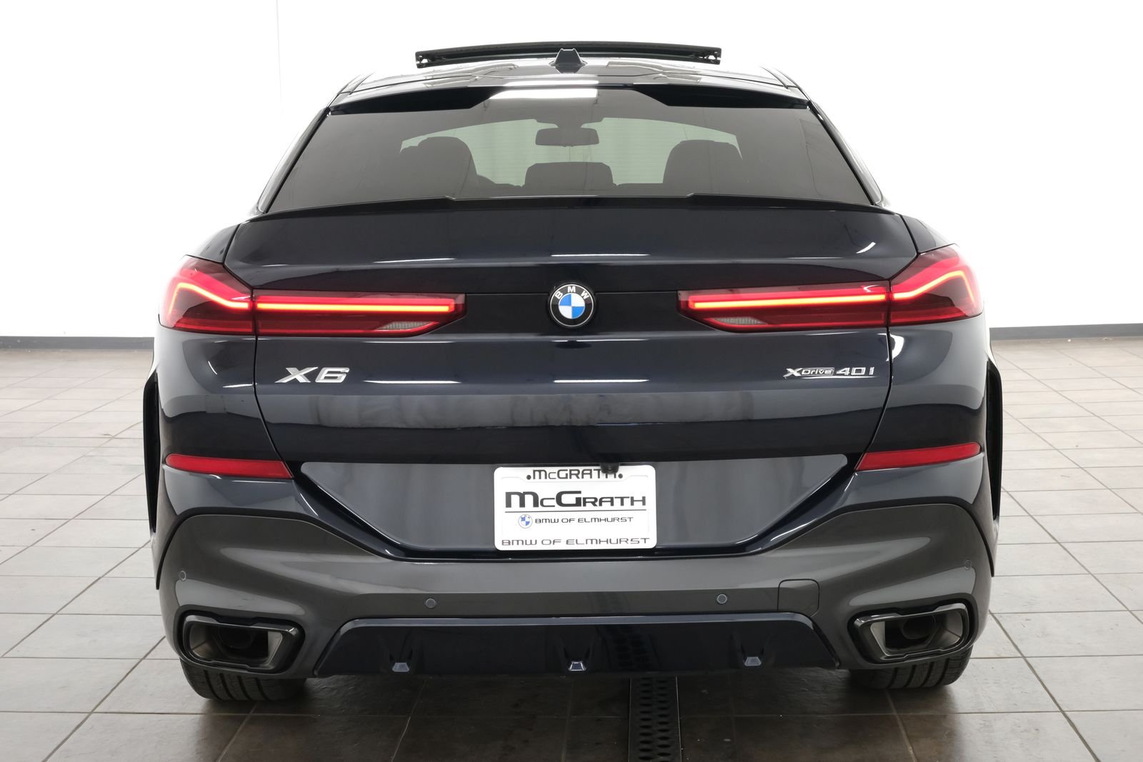 Certified Used 2024 Carbon Black Metallic BMW xDrive40i image 4