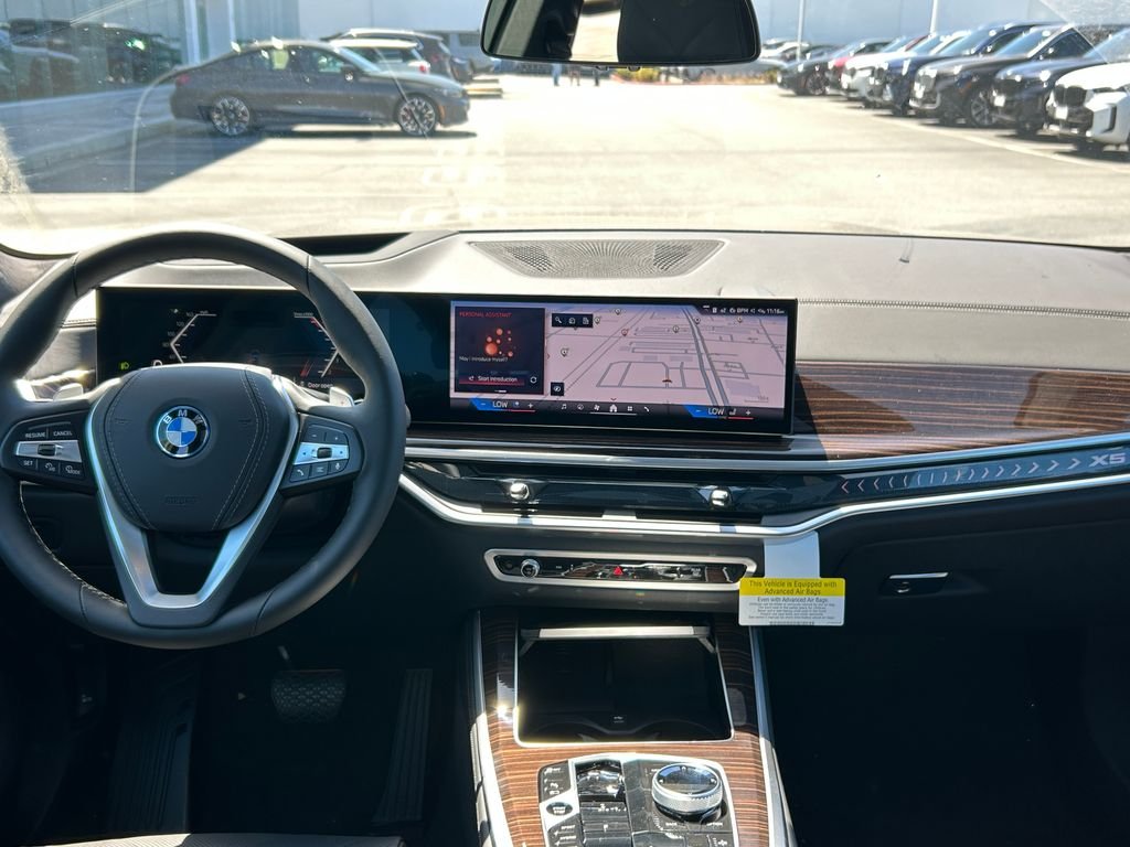 New 2026 Black Sapphire Metallic BMW xDrive50e image 34
