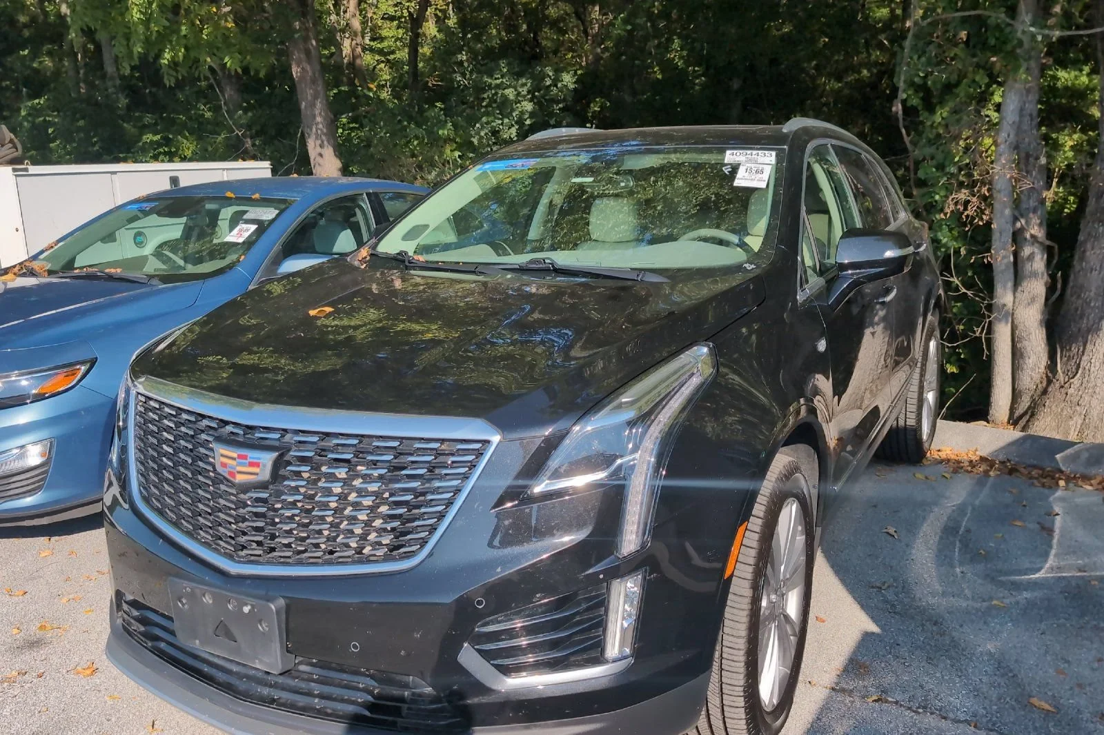 Used 2023 STELLAR BLACK METALLIC Cadillac FWD Premium Luxury image 9