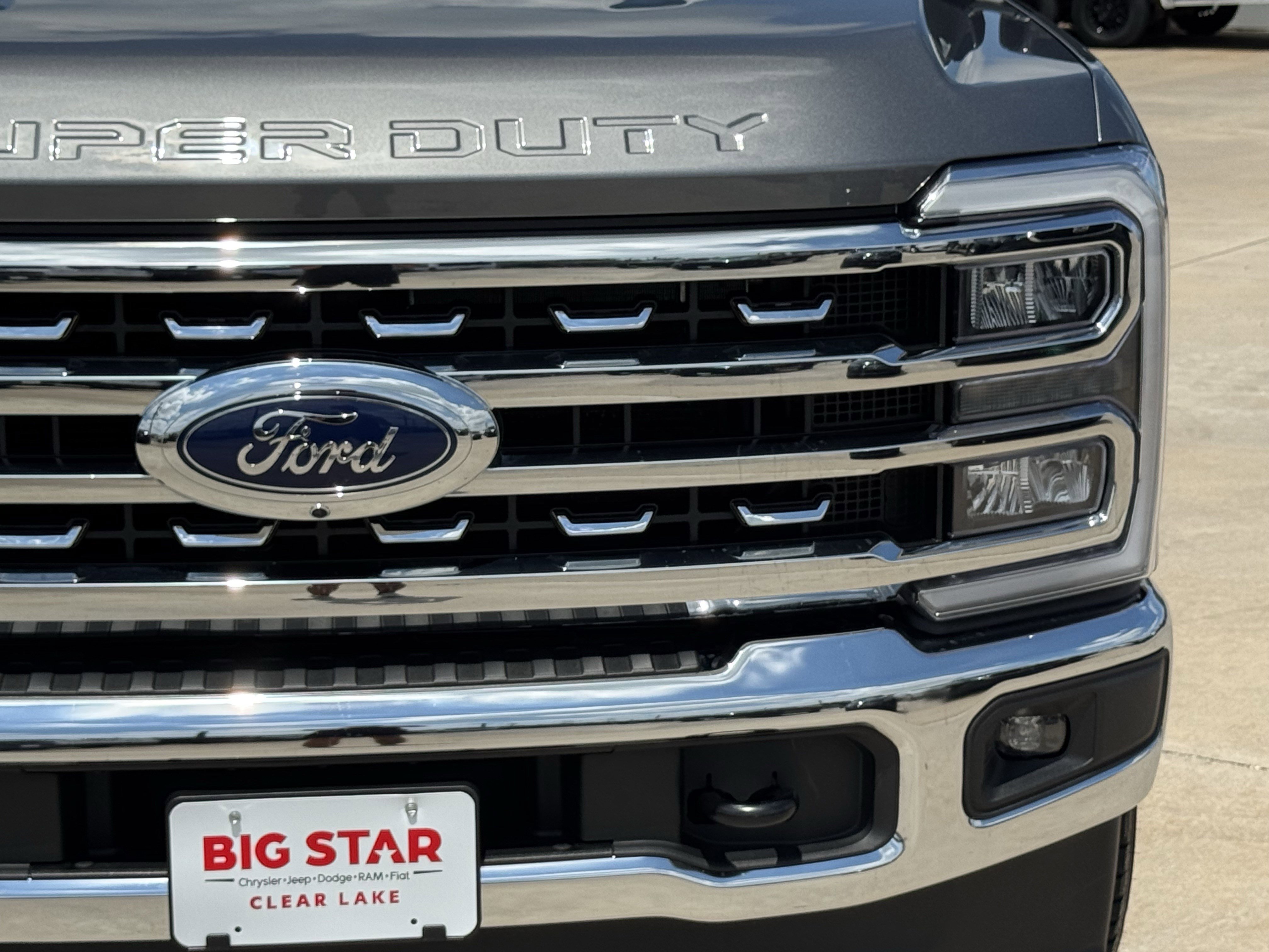 Used 2025 Gray Metallic Ford LARIAT 4WD Crew Cab 6.75