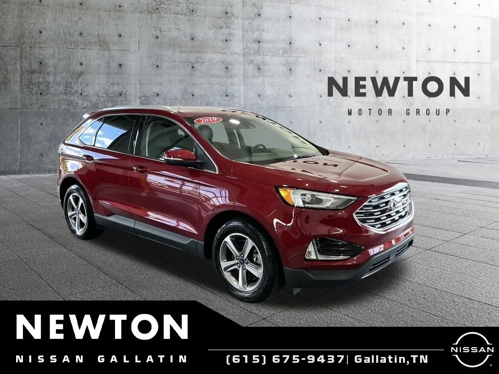 Used 2019 Ruby Red Metallic Ford SEL image 1