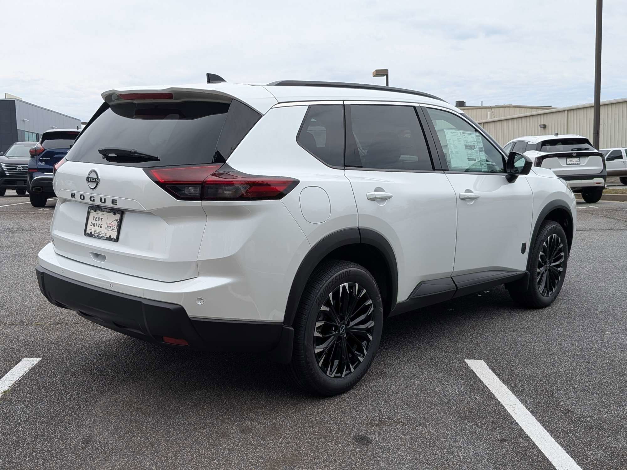 New 2026 White Nissan Dark Armor image 3