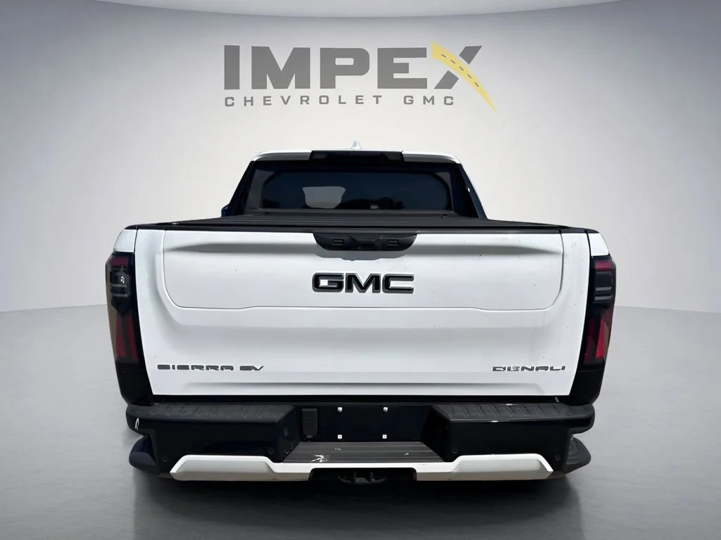 Used 2025 Summit White GMC Max Range Denali image 3