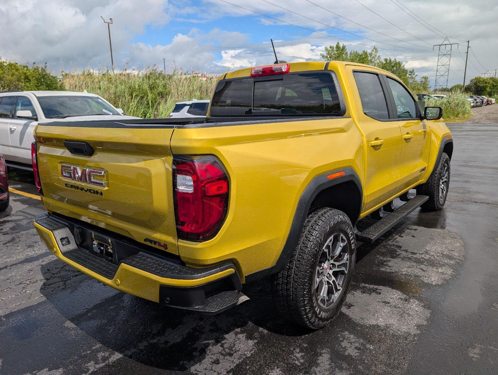 Used 2023 Solar Flare Metallic GMC 4WD AT4 image 8