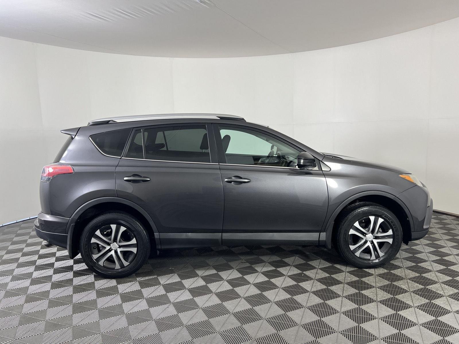 Used 2016 Magnetic Gray Metallic Toyota LE image 13