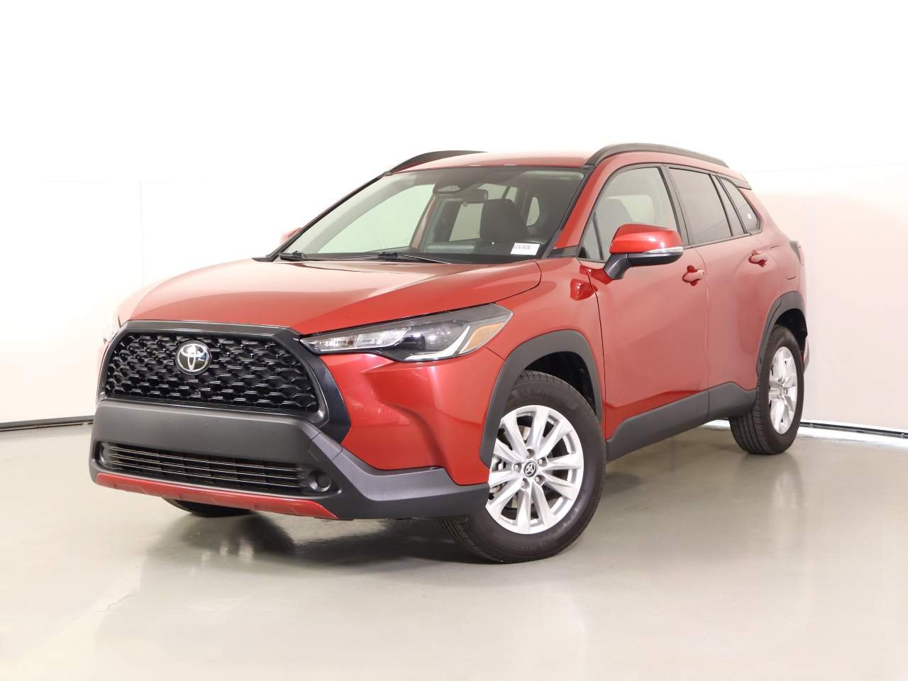 Used 2024 Barcelona Red Metallic Toyota LE image 1