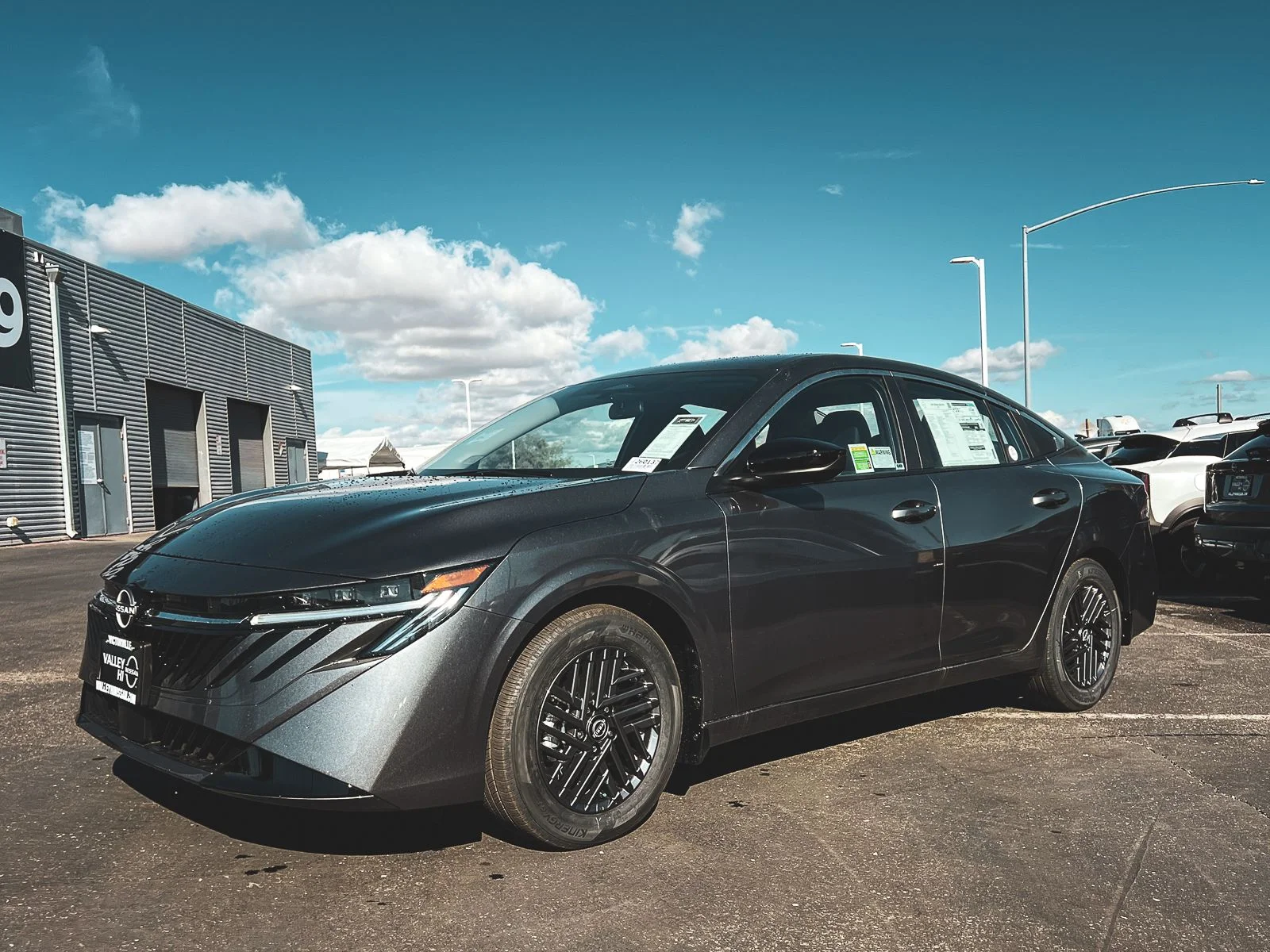 New 2026 Gun Metallic Nissan SV image 7