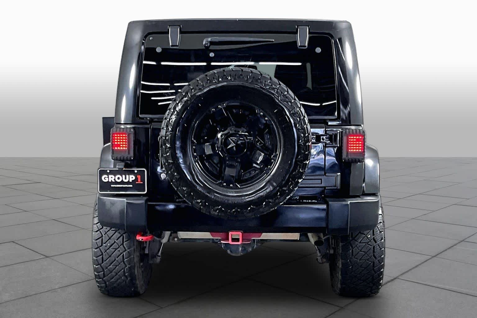 Used 2014 Black Clearcoat Jeep Altitude image 5
