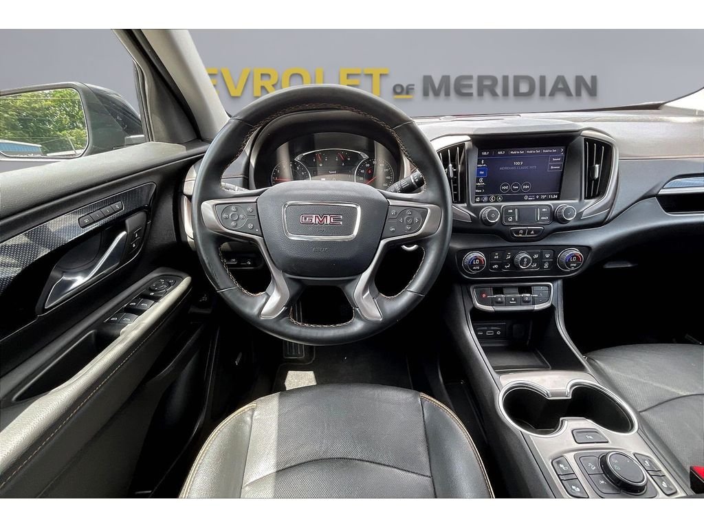 Used 2024 Ebony Twilight Metallic GMC AT4 image 5