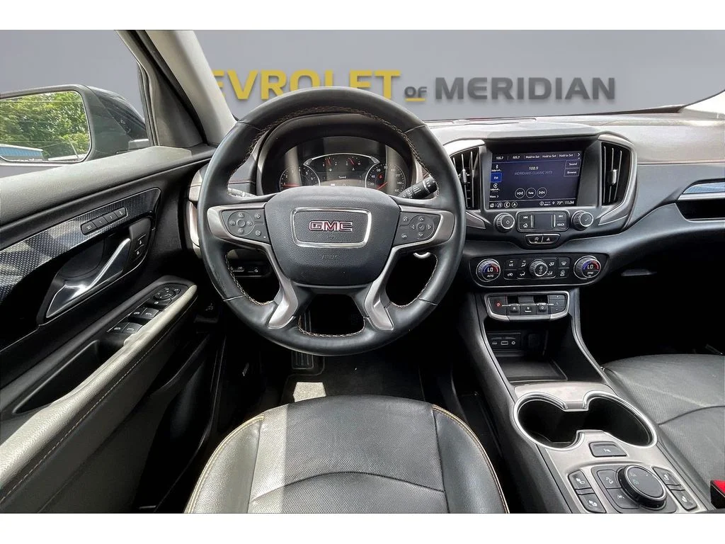 Used 2024 Ebony Twilight Metallic GMC AT4 image 5