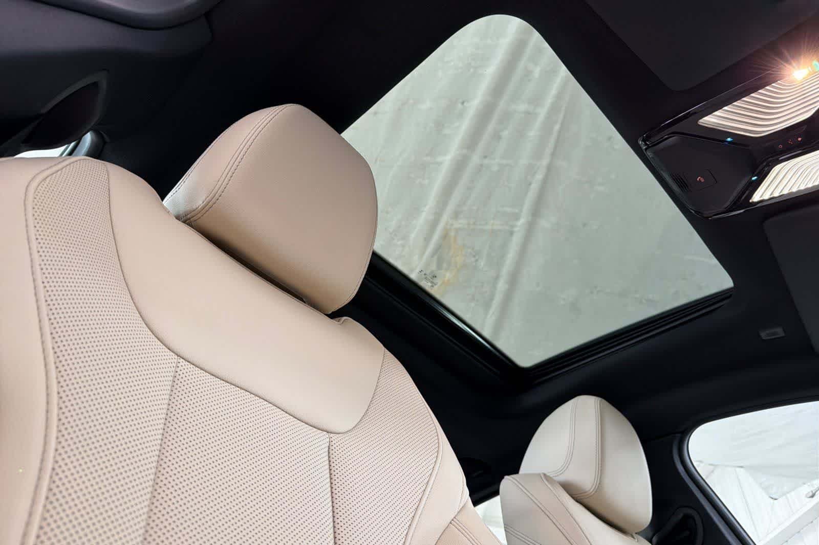Used 2024 Sunset Orange Metallic BMW eDrive40 image 16