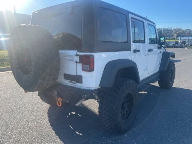Used 2018 White Jeep Unlimited Sport image 3