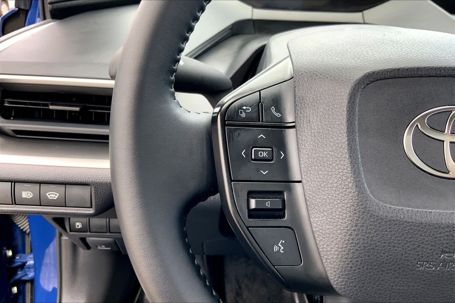 Used 2025 Reservoir Blue Toyota LE image 23