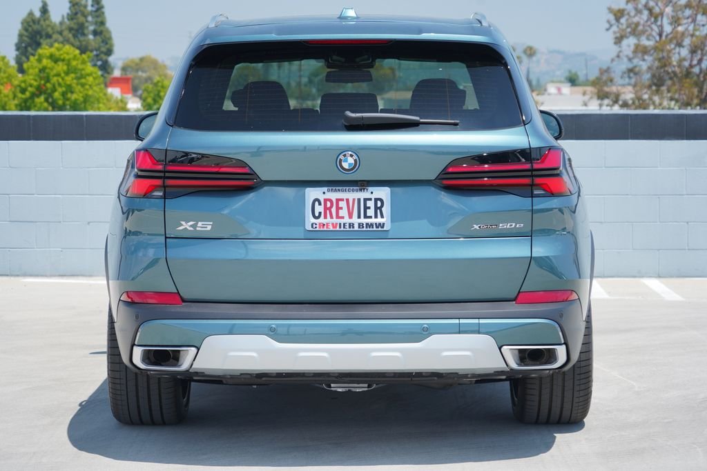 New 2026 Blue Ridge Mountain Metallic BMW xDrive50e image 7