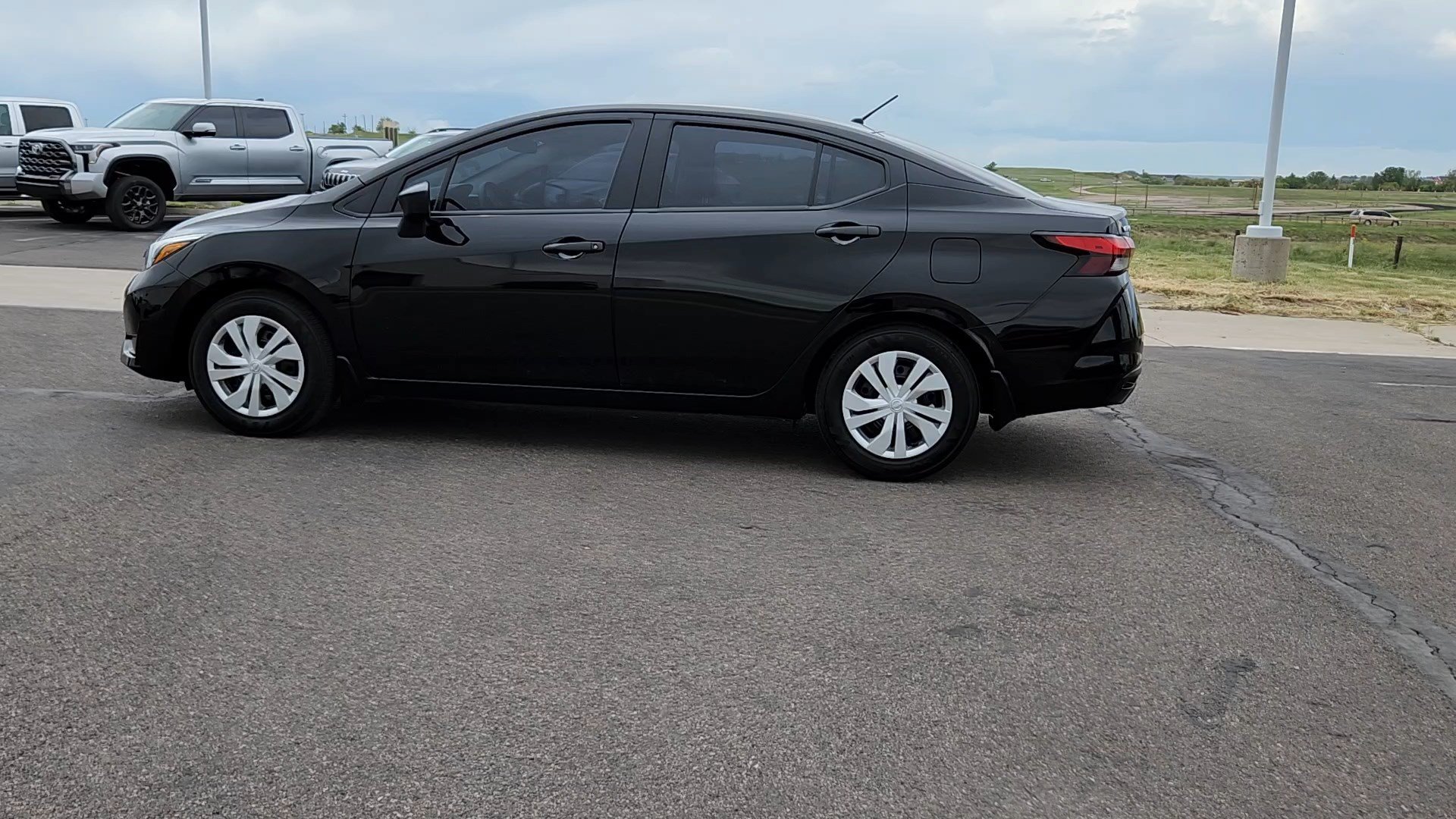 Certified Used 2025 Black Nissan S image 2