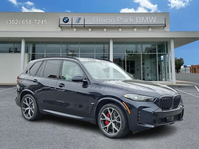 New 2026 Carbon Black Metallic BMW xDrive50e image 3