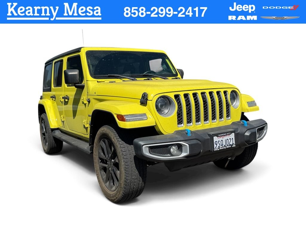 Used 2023 Yellow Jeep Sahara 4xe image 1