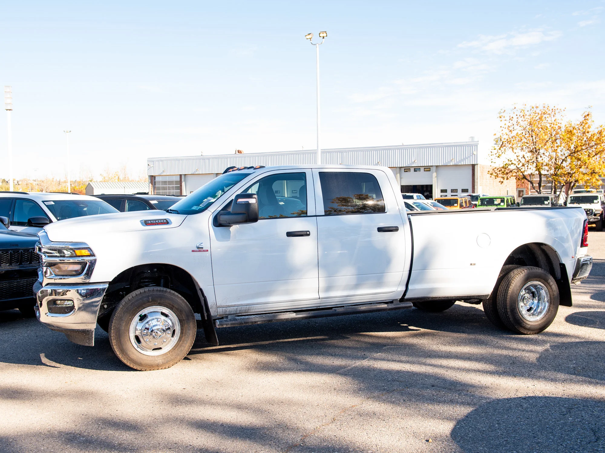 New 2026 White RAM Tradesman* Dually 8
