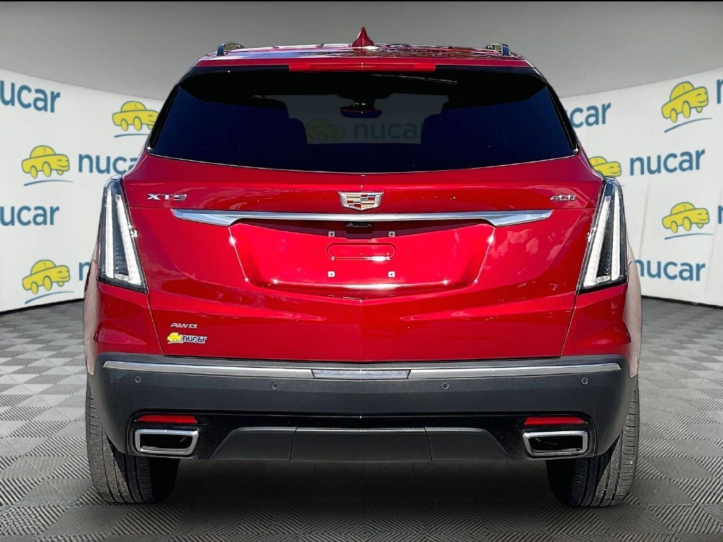 Used 2024 Radiant Red Tintcoat Cadillac Sport image 5
