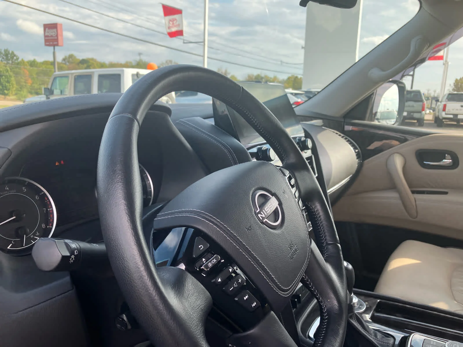 Used 2024 Aspen White Tricoat Nissan Platinum image 9