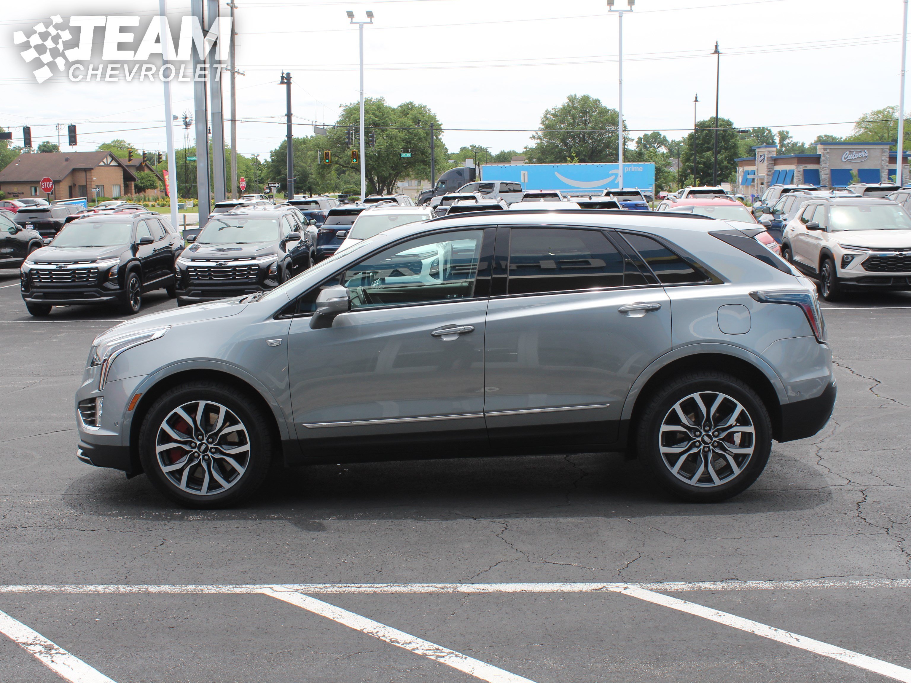 Used 2024 Argent Silver Metallic Cadillac Sport image 7