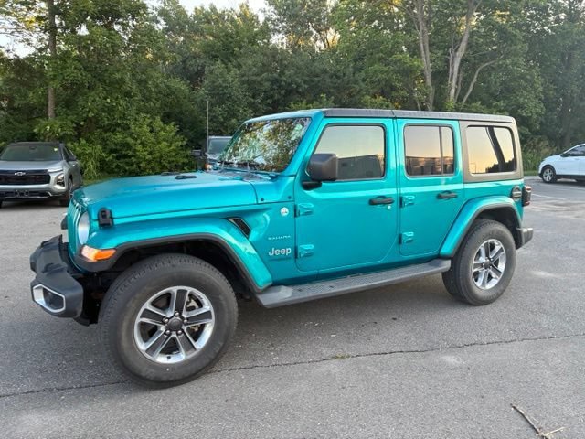 Used 2019 Jeep Wrangler Unlimited Sahara with VIN 1C4HJXEGXKW597673 for sale in Kansas City