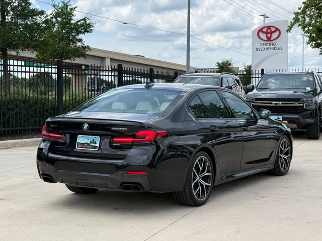 Used 2023 Black BMW M550i xDrive image 4