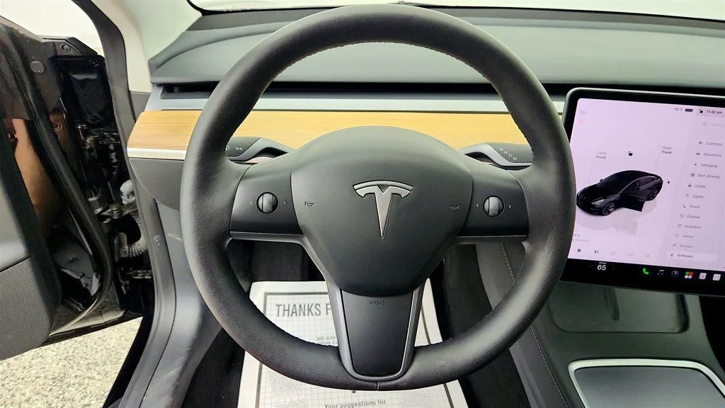 Used 2023 Solid Black Tesla RWD image 14