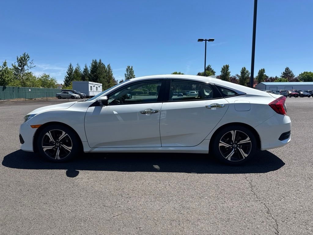 Used 2016 White Orchid Pearl Honda Touring image 4