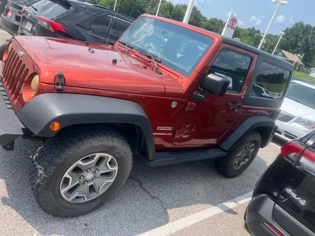 Used 2014 Orange Jeep Sport image 2
