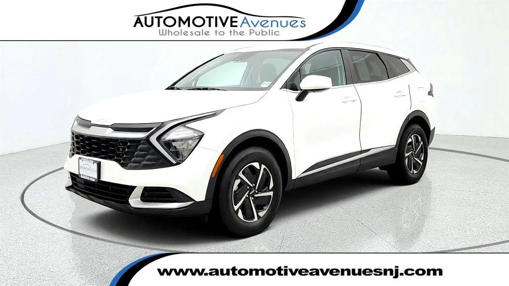 Used 2023 Snow White Pearl Kia LX AWD image 1