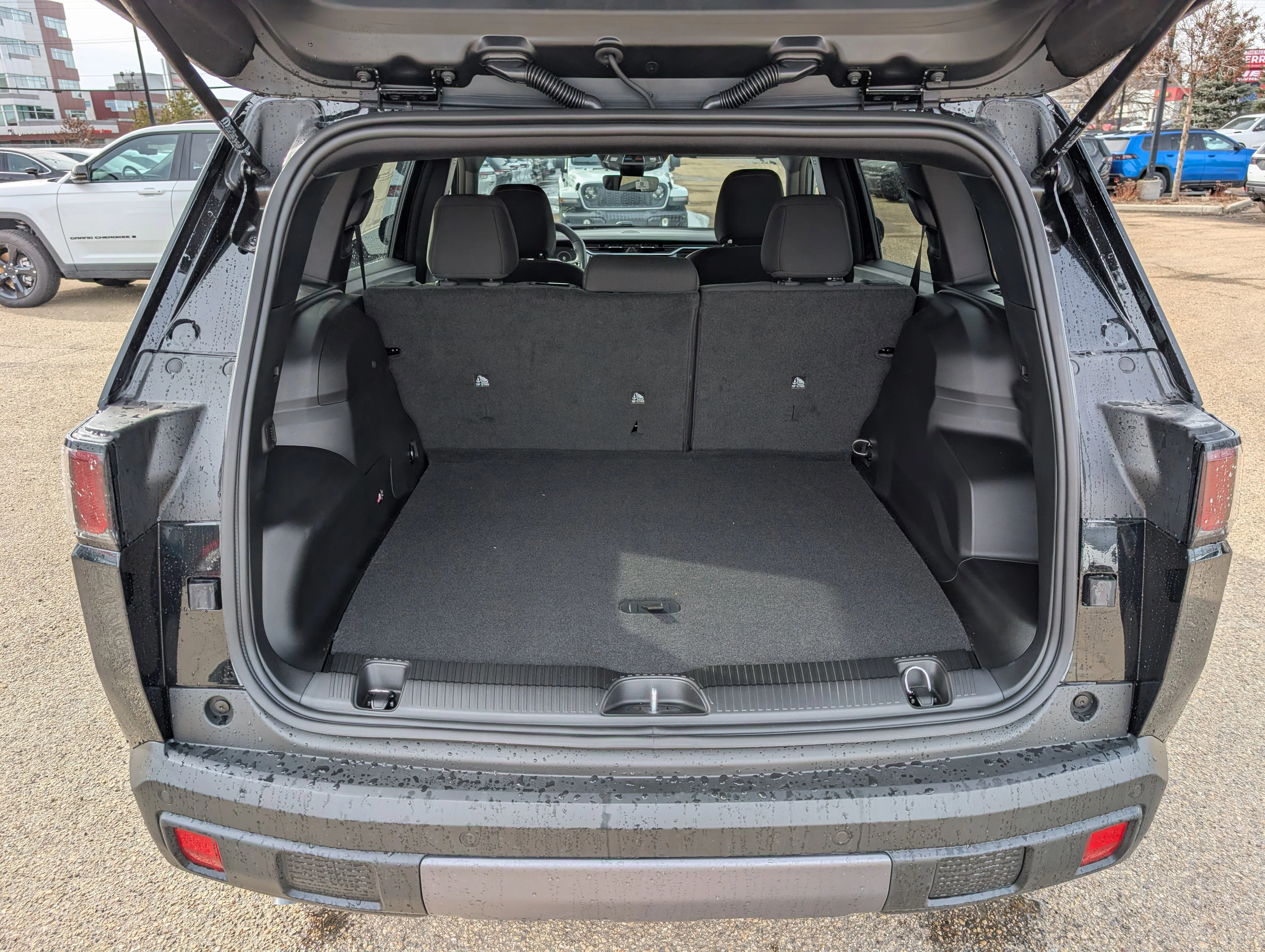 New 2026 Diamond Black Crystal Pearl Jeep Laredo image 6