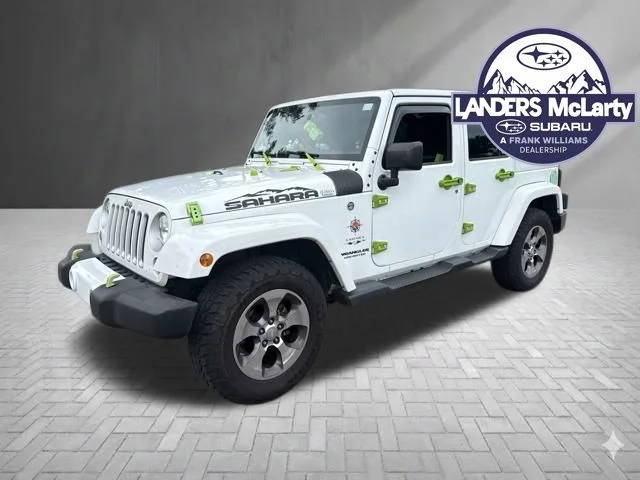 Used 2016 White Jeep Unlimited Sahara image 8