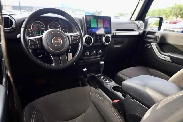 Used 2017 Black Jeep Unlimited Sahara image 25