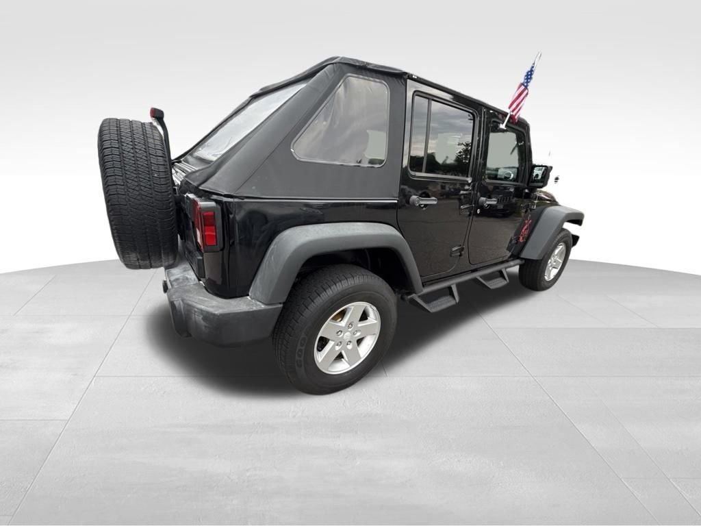 Used 2014 Black Jeep Unlimited Rubicon image 5