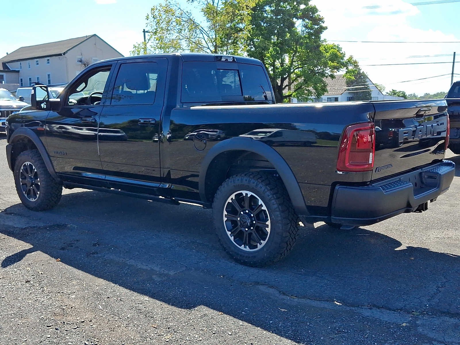 New 2026 Diamond Black Crystal Pearl-Coat Exterior Paint RAM Rebel image 4