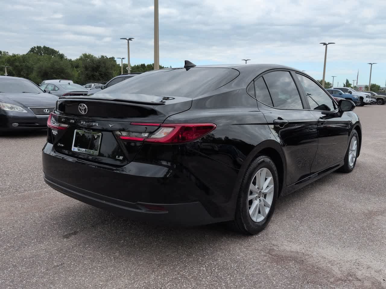 Used 2025 Midnight Black Metallic Toyota LE image 6