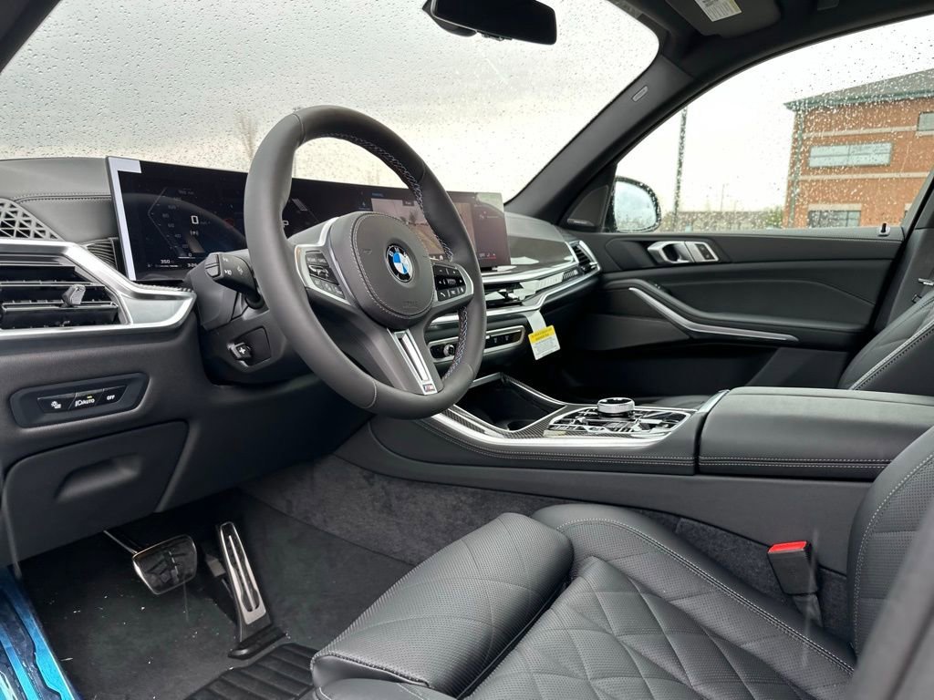 New 2026 Black Sapphire Metallic BMW M60i image 16