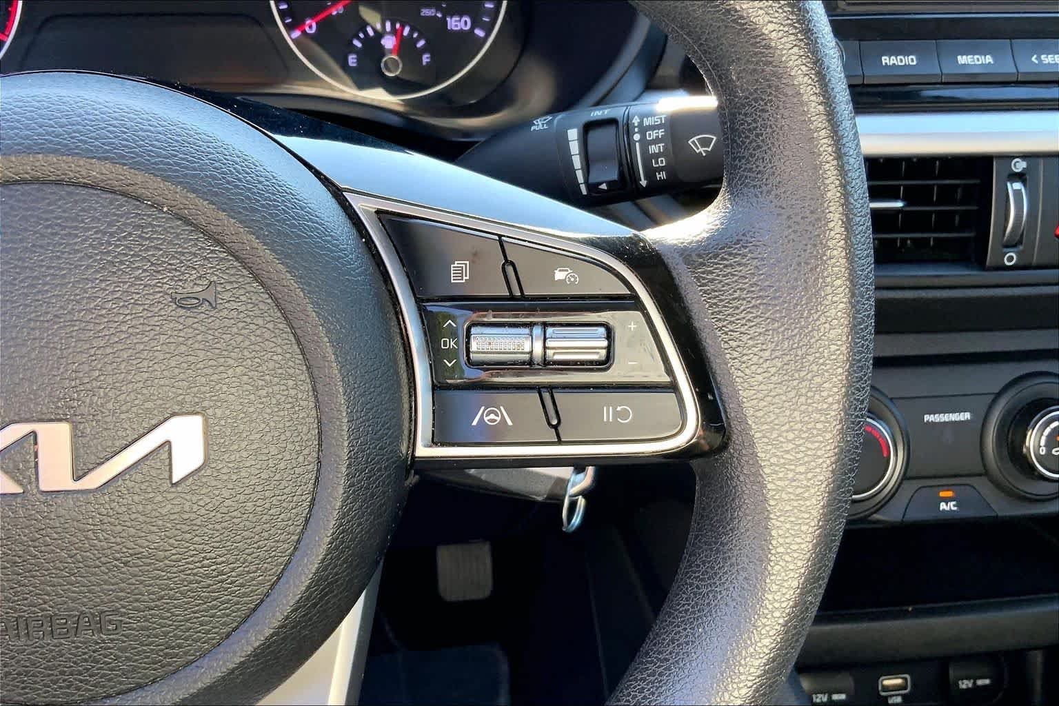 Used 2023 Snow White Pearl Kia LXS image 24
