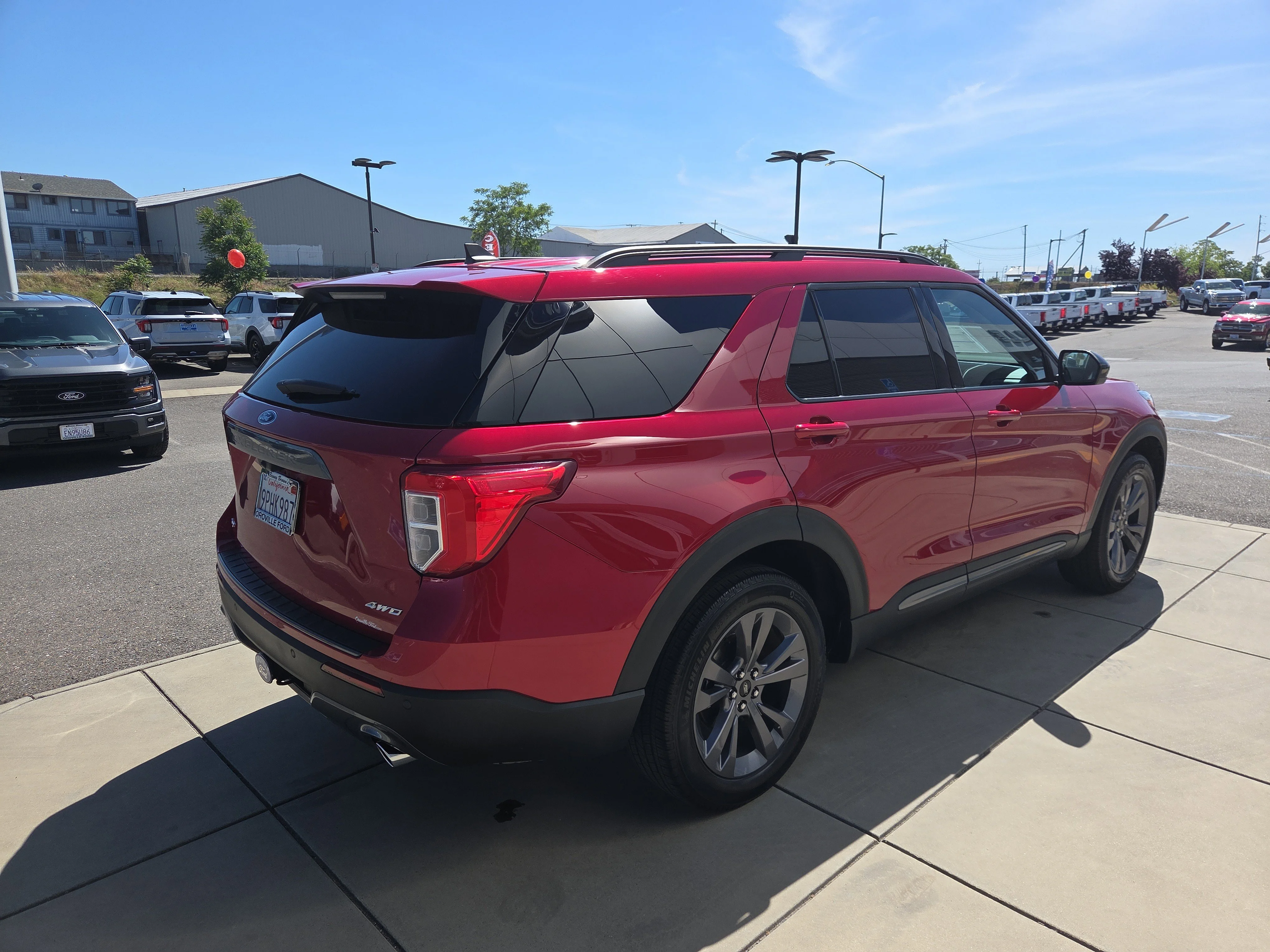 Used 2024 Rapid Red Metallic Tinted Clearcoat Ford XLT image 5