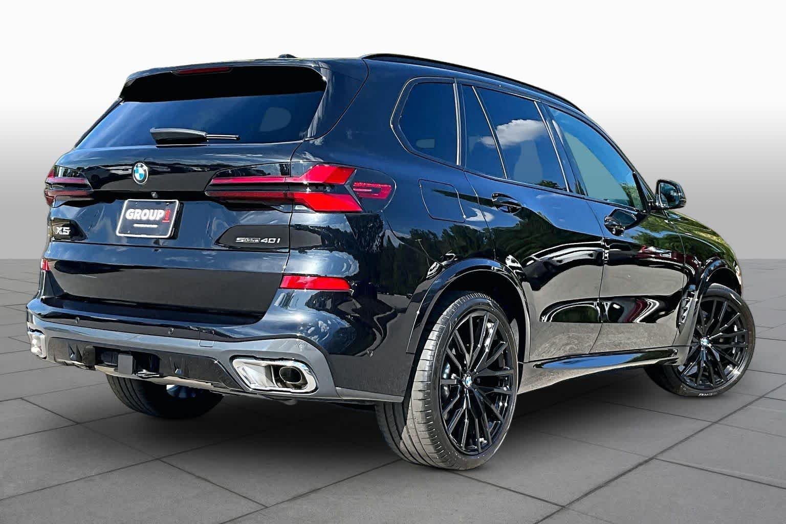 Certified Used 2024 Black Sapphire Metallic BMW sDrive40i image 12